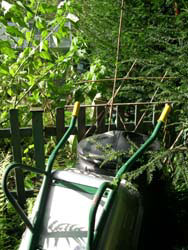composter and wheelbarrow