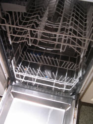 dishwasher waiting for plates and pots