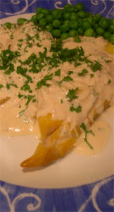 haddock with a creamy onion and parsley sauce.