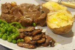 Photo: Steak and kidney with braised mushrooms