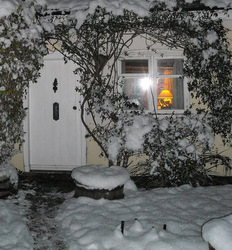 Photo: The Cottage at dusk in the snow