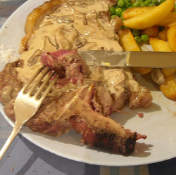 Photo: T bone steak with mushroom and cream sauce