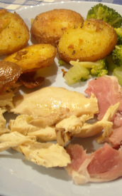 Crispy fried potatoes with green vegetables and chicken and ham
