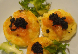 Potato pancakes with cream cheese, smoked salmon and lumpfish caviar