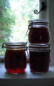 Photo: Bottled cherry plums