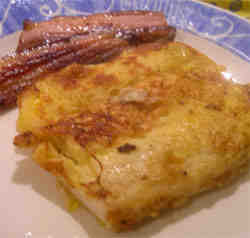 Delicious plate of eggy bread with bacon