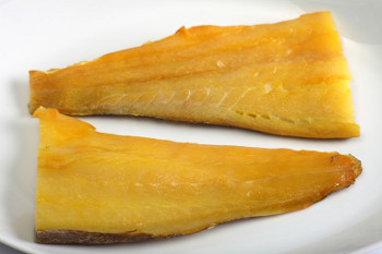 photo of two fillets of smoked haddock ready for cooking in this chowder recipe