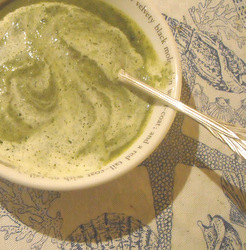 Photo of our delicious watercress soup recipe in a bowl with a swirl of cream