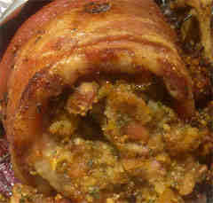 Photo of roasted breast of lamb, rolled and stuffed with apricot stuffing